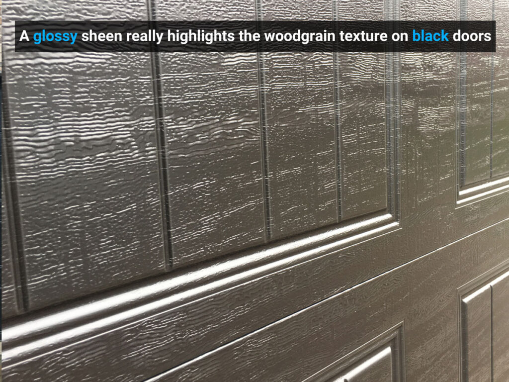 clopay's woodgrain texture in black up close